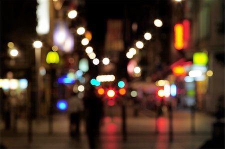 This photograph represent a beautiful out of focus light of traffic on a street at night Foto de stock - Super Valor sin royalties y Suscripción, Código: 400-05299062