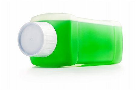 simsearch:400-04615992,k - Transparent plastic bottle with green cleaning liquid. Lying horizontal. Fotografie stock - Microstock e Abbonamento, Codice: 400-05299189