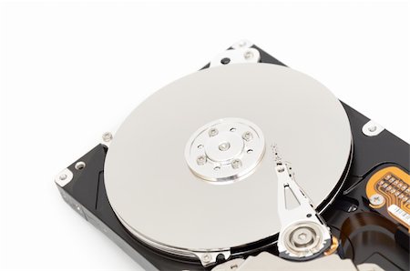 simsearch:400-03992953,k - Opened computer harddisk on a white background Stock Photo - Budget Royalty-Free & Subscription, Code: 400-05299262