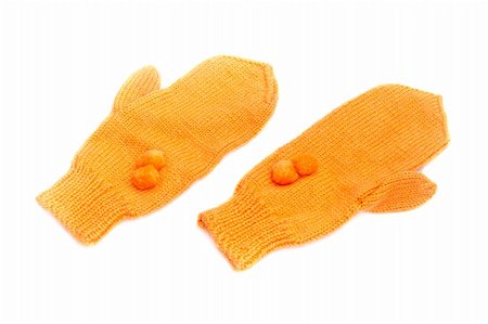 orange knitted mitten isolated on white background Foto de stock - Royalty-Free Super Valor e Assinatura, Número: 400-05299286