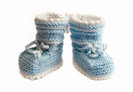 sock foot shoe - little babys bootee light blue isolated white background Stock Photo - Budget Royalty-Free & Subscription, Code: 400-05299280