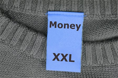simsearch:614-02740316,k - word money on xxl fashion label showing business success concept Stockbilder - Microstock & Abonnement, Bildnummer: 400-05299342