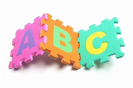 Alphabet Puzzle Pieces on White Background Stock Photo - Budget Royalty-Free & Subscription, Code: 400-05290418