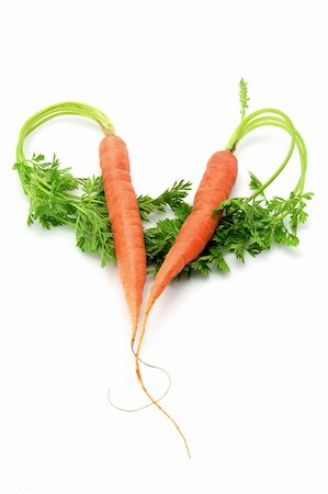 simsearch:400-05369257,k - Carrots in Heart Shape on White Background Photographie de stock - Aubaine LD & Abonnement, Code: 400-05290566