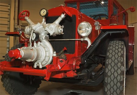 fire trucks with fire - red antique restored firefighters truck Stock Photo - Budget Royalty-Free & Subscription, Code: 400-05290739