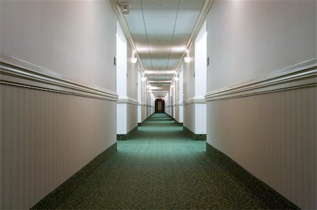 A hotel hallway. Vanishing point perspective. Stock Photo - Budget Royalty-Free & Subscription, Code: 400-05291117