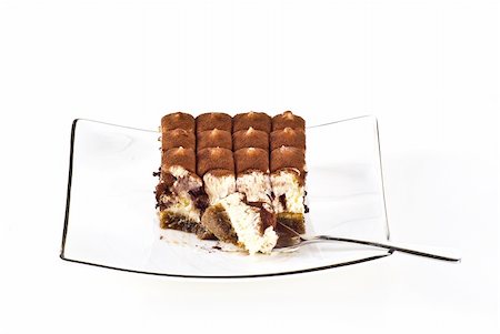 simsearch:400-05230772,k - Tiramisu cake on the plate over white background Foto de stock - Royalty-Free Super Valor e Assinatura, Número: 400-05291288