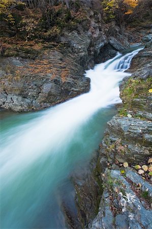 simsearch:400-05377103,k - Waterfalls on Rocky Stream, Running Through Autumn Mountain Forest (long time exposure) Stock Photo - Budget Royalty-Free & Subscription, Code: 400-05291400