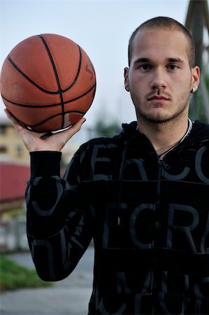 simsearch:400-04779709,k - basketball player practicing and posing for basketball and sports athlete concept Fotografie stock - Microstock e Abbonamento, Codice: 400-05291473