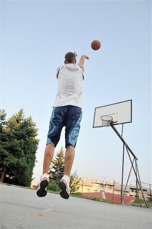 simsearch:400-04779709,k - basketball player practicing and posing for basketball and sports athlete concept Fotografie stock - Microstock e Abbonamento, Codice: 400-05291485