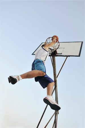 simsearch:400-04779709,k - basketball player practicing and posing for basketball and sports athlete concept Fotografie stock - Microstock e Abbonamento, Codice: 400-05291480