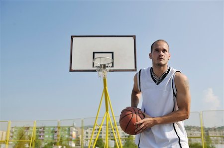 basketball player practicing and posing for basketball and sports athlete concept Stock Photo - Budget Royalty-Free & Subscription, Code: 400-05291585