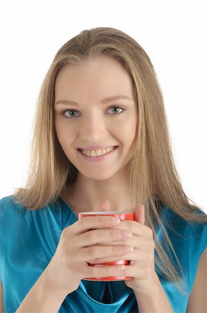 endorsing - Woman with brackets on teeth and cup isolated in white Stock Photo - Budget Royalty-Free & Subscription, Code: 400-05291713
