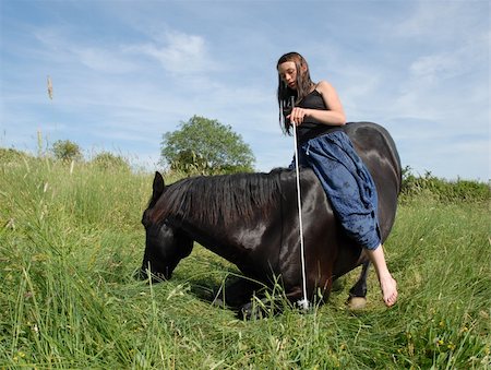 simsearch:400-04256024,k - young teenager and her black horse Stock Photo - Budget Royalty-Free & Subscription, Code: 400-05292060