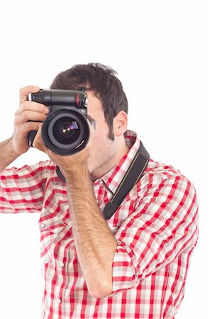 shooting the head with the hand - Young Man Photographer Taking Photos Stock Photo - Budget Royalty-Free & Subscription, Code: 400-05292095