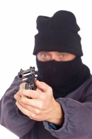 simsearch:694-03328255,k - Thie Aiming a Gun on a Robbery Photographie de stock - Aubaine LD & Abonnement, Code: 400-05292098