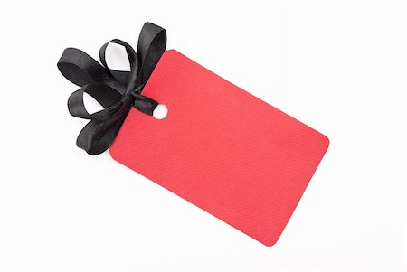 simsearch:400-04752957,k - Red gift tag with black bow Photographie de stock - Aubaine LD & Abonnement, Code: 400-05292249