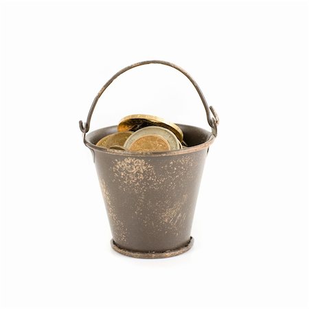 simsearch:400-04894431,k - bucket full of coins isolated on a white Stock Photo - Budget Royalty-Free & Subscription, Code: 400-05292482