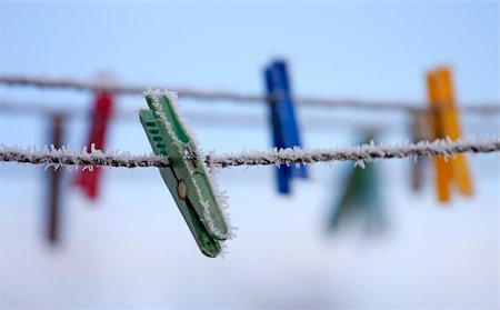 Frozen pegs on the wire. Stock Photo - Budget Royalty-Free & Subscription, Code: 400-05293042