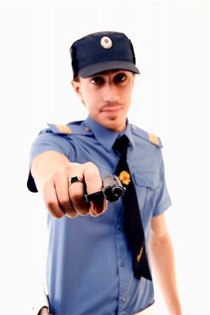 policeman with gun pointed at you Stockbilder - Microstock & Abonnement, Bildnummer: 400-05293275