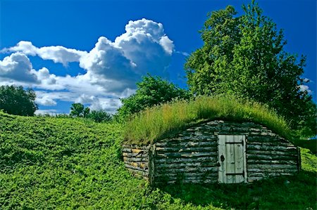 Ancient earth house near medieval Russian fortress Stock Photo - Budget Royalty-Free & Subscription, Code: 400-05293526