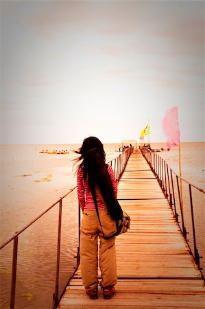 the girl stand at the bridge. Stock Photo - Budget Royalty-Free & Subscription, Code: 400-05293595