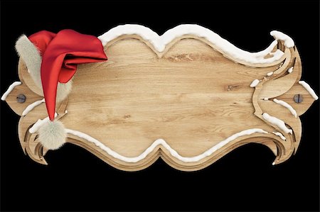 simsearch:400-06099858,k - on a wooden banner covered with snow hanging hat of Santa Claus. isolated on black including clipping path Stock Photo - Budget Royalty-Free & Subscription, Code: 400-05293715