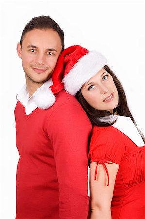 simsearch:400-04805110,k - in love young couple brunette in red christmas clothes Stock Photo - Budget Royalty-Free & Subscription, Code: 400-05304060
