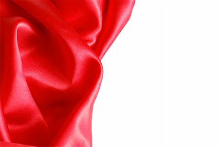 simsearch:400-07634587,k - A red satin fabric over a white background with plenty of copyspace. Stock Photo - Budget Royalty-Free & Subscription, Code: 400-05304709