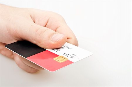 einkaufssüchtiger (männlich) - Male hand holding credit card Stockbilder - Microstock & Abonnement, Bildnummer: 400-05304737