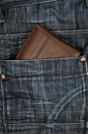 simsearch:400-05903480,k - Wallet in jeans back pocket Photographie de stock - Aubaine LD & Abonnement, Code: 400-05304731