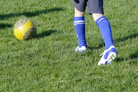 simsearch:400-07621211,k - boy on training Soccer the colored photo Foto de stock - Super Valor sin royalties y Suscripción, Código: 400-05304830