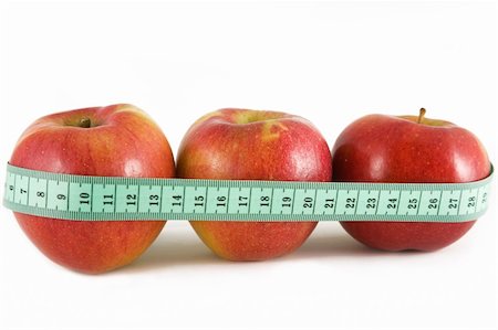 simsearch:400-03990146,k - three red apple and green measurement tape, diet and healthy life concept Foto de stock - Royalty-Free Super Valor e Assinatura, Número: 400-05304918