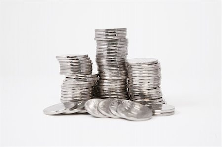 Stacks of silver coins on white background Stock Photo - Budget Royalty-Free & Subscription, Code: 400-05304922