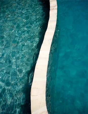 simsearch:400-05215524,k - Clear blue water in the swimming pool Foto de stock - Super Valor sin royalties y Suscripción, Código: 400-05305082