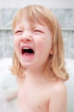 boy with long blond hair sitting in bathtub, screaming Stock Photo - Budget Royalty-Free & Subscription, Code: 400-05305348