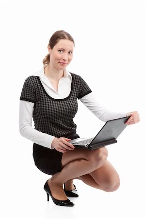 simsearch:400-04118241,k - Smiling business woman. Isolated over white background Photographie de stock - Aubaine LD & Abonnement, Code: 400-05305580