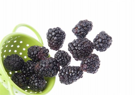 fruits colander - Fresh Healthy Blackberries in a Vibrant Green Colander Border Image. Stock Photo - Budget Royalty-Free & Subscription, Code: 400-05305947