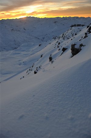 simsearch:400-09275246,k - mountain snow fresh sunset at ski resort in france val thorens Photographie de stock - Aubaine LD & Abonnement, Code: 400-05306924