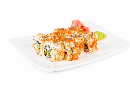 Sushi rolls at plate isolated on a white Stock Photo - Budget Royalty-Free & Subscription, Code: 400-05306940