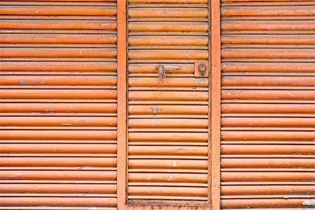 Old and grunge metal wall with closed door. Stock Photo - Budget Royalty-Free & Subscription, Code: 400-05306950