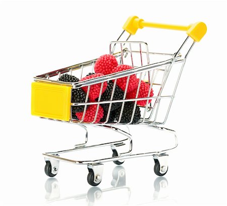 shopping in health store vitamins - Raspberry blackberry fruit in the shopping cart Photographie de stock - Aubaine LD & Abonnement, Code: 400-05307135