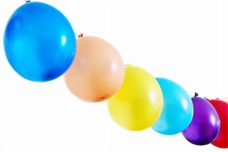elyrae (artist) - Simple diagonal line of colorful balloons on white background Photographie de stock - Aubaine LD & Abonnement, Code: 400-05307482