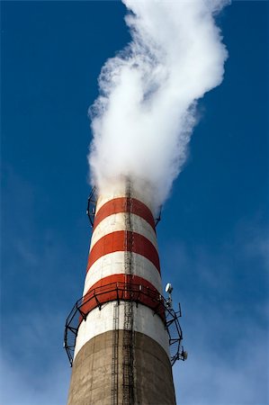 simsearch:400-04309303,k - high tube with white smoke against the blue sky Stock Photo - Budget Royalty-Free & Subscription, Code: 400-05307502