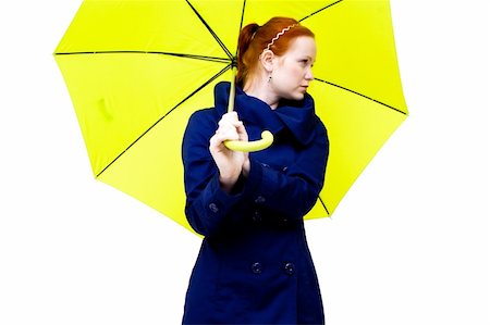 redhead young woman holding an yellow umbrella Stock Photo - Budget Royalty-Free & Subscription, Code: 400-05307722