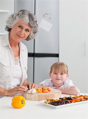 simsearch:400-04306517,k - Lovely girl and her grandmother looking at the camera Stock Photo - Budget Royalty-Free & Subscription, Code: 400-05307775