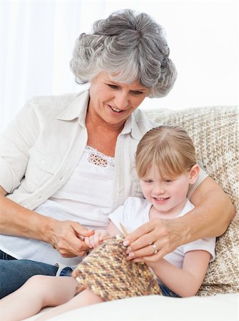 Grandmother helping her little girl to knit Stock Photo - Budget Royalty-Free & Subscription, Code: 400-05307778