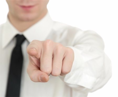 Young man pointing finger isolated on white Foto de stock - Super Valor sin royalties y Suscripción, Código: 400-05307932