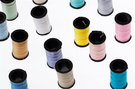 Spools of Thread Background with Many Colors on White. Stock Photo - Budget Royalty-Free & Subscription, Code: 400-05308062
