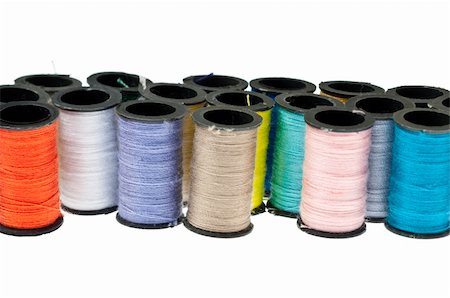 Spools of Thread Background with Many Colors on White. Stock Photo - Budget Royalty-Free & Subscription, Code: 400-05308063